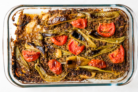 Turkish Food Baked Potato Casserole with Minced Meat Tomatoes and Green Pepper / Kiymali Patates. Traditional Food.の写真素材