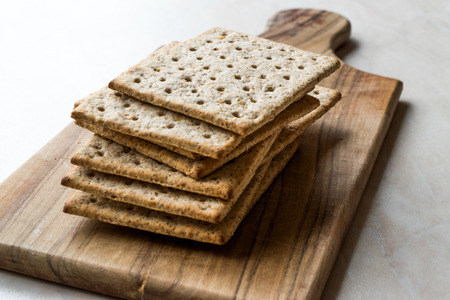 Stack of Honey Flavored Graham Crackers on Wooden Surface. Healthy Snacks.の写真素材