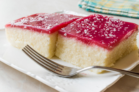 Turkish Semolina Dessert Muhallebi Pudding with Jelly Raspberry and Coconut Powder / Trileceの写真素材