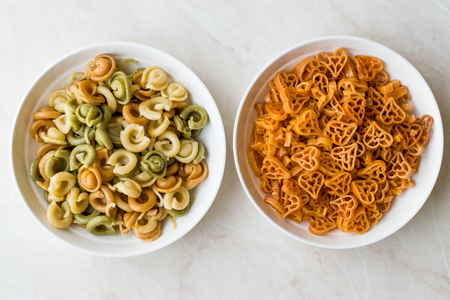 Ufo and Heart Shaped Colorful Pasta For Children. Organic Healthy Food.