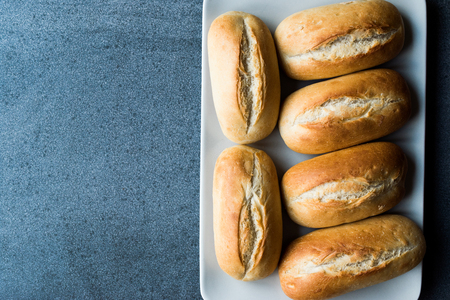 Freshly Baked Baguette Bread in Plate. Organic French Francala Bakeryの写真素材