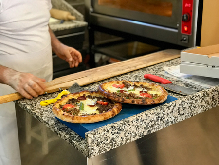 Turkish Round Pide Traditional food with beef and Salad. Traditional Food.の写真素材
