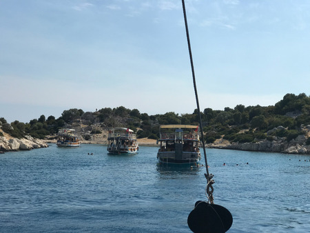 Antalya, Turkey - February 23, 2018: Sunken city of Kekova in bay of Ucagiz view from sea in Antalya province of Turkey with turqouise sea rocks and ancient cityのeditorial素材