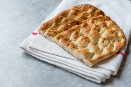 Turkish Bread Tirnak Pide or Pita for Kebab. Traditional Bakery Pastries.の写真素材