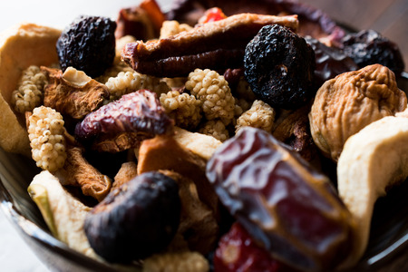 Dried Fruits; Apple, Apricot, Mulberry, Raisin, Fig, Cranberry, Raspberry and Date in Bowl. Organic...
