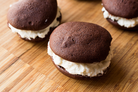 Homemade Chocolate Whoopie Pies Filled with Vanilla Butter Cream. Dessert Concept.の写真素材