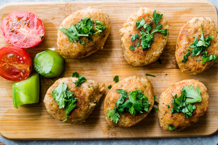 Fried Chicken Meatballs on Wooden Board / Kofta or Kofte. Fast Food.の写真素材