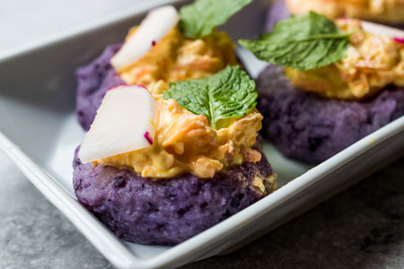Red Cabbage Mash with Mashed Potatoes , Carrot, Yogurt and Mint Leaves for Appetizer / Healthy Round Canape Snacks. Organic Food.の写真素材