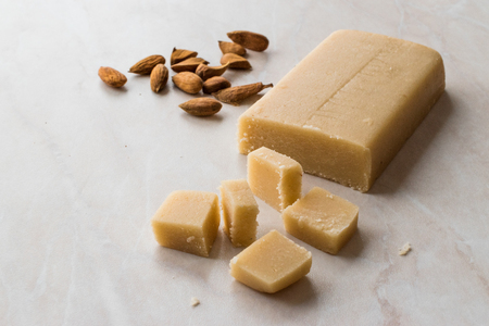 Homemade Almond Paste Whole Marzipan on Wooden Board. Organic Food.