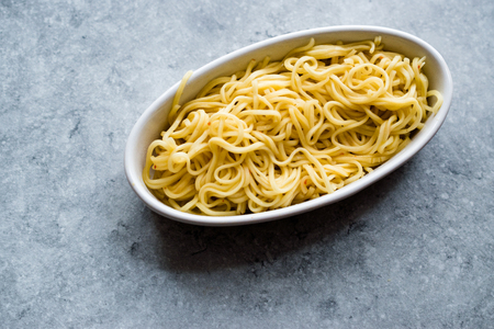 Instant Curry Flavored Ramen Noodles served with Chopsticks. Traditional Fast Food.の写真素材