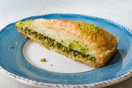 Turkish Baklava with Pistachio served with Plate / Havuc Dilimi. Traditional Dessert.の写真素材
