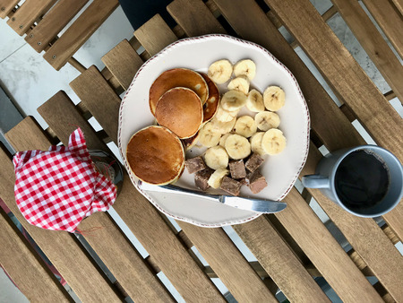 Pancake Breakfast with Banana Slices, Coffee and Jam. Organic Food.の写真素材