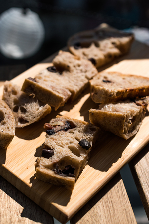 Artisan Bakery Bread Slices with Walnut and Dried Grape. Organic Food.の写真素材