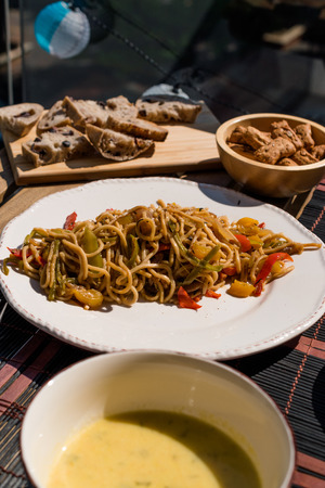Homemade Noodle with Vegetables in Sunny Day Ready to Eat. Traditional Organic Food.の写真素材