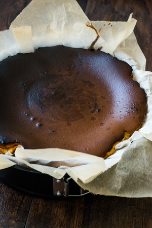 San Sebastian Cheesecake in Cake Pan Mold / Creamy Plain. Traditional Spain Style.の写真素材