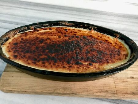 Turkish Dessert Baked Helva in Casserole / Halva in Guvec. Organic Food.の写真素材