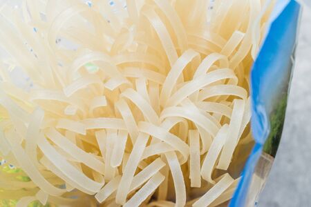 Raw Rice Noodle in Plastic Package / Container Ready to Use.  Organic Food.の写真素材