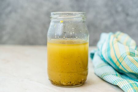 Salad Dressing Mustard Sauce in Glass Bowl Ready to Use. Organic Food.