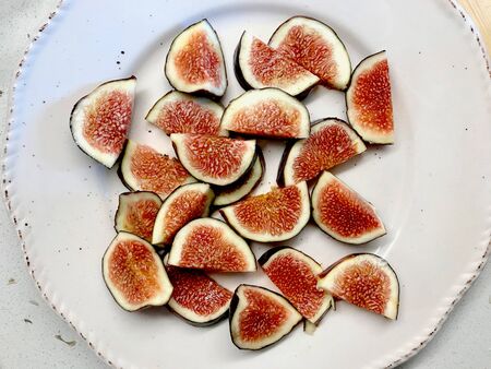 Sliced Fresh Ripe Fig Slices Ready to Use / Eat. Organic Fruit.の写真素材