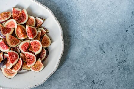 Sliced Fresh Ripe Fig Slices Ready to Use / Eat. Copy Space. Organic Food.の写真素材