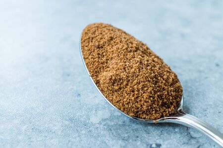 Coconut Sugar in Plastic Metal Spoon Ready to Use. Organic Product.の写真素材