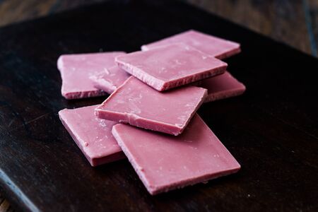 Ruby Chocolate Pieces. New Type of Processing Cocoa Beans.  Sweet Snacks.