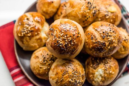 Homemade Turkish Pastries Pogaca with Black Cumin and Sesame Seeds. Traditional Organic Food.の写真素材