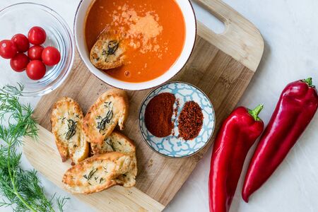 Tomato Soup with Parmesan Cheese Bread in Natural Light and Sunlight. Homemade Organic Food.