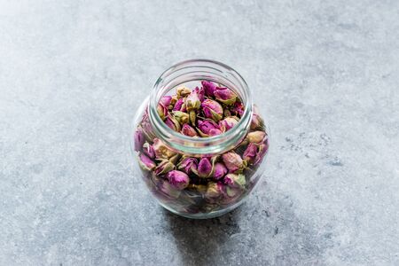 Dried Pink Rose Bud in Glass Jar. Organic Healthy Product.の写真素材