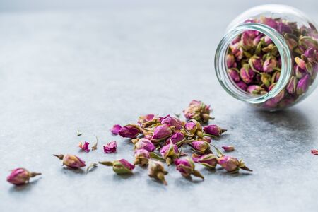 Dried Pink Rose Bud in Glass Jar. Organic Healthy Product.の写真素材