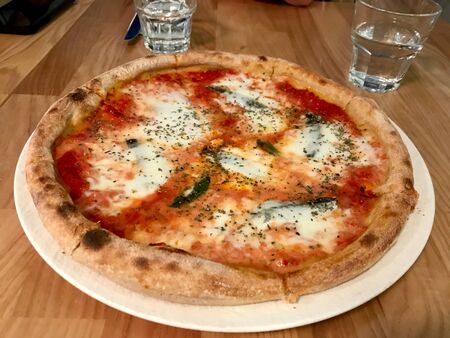 Traditional Italian Napoli Pizza with Anchovies. Organic Food.