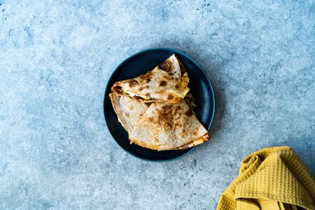 Veggie Italian Closed Calzone Pizza Slices with Mushrooms. Traditional Fast Food.の写真素材