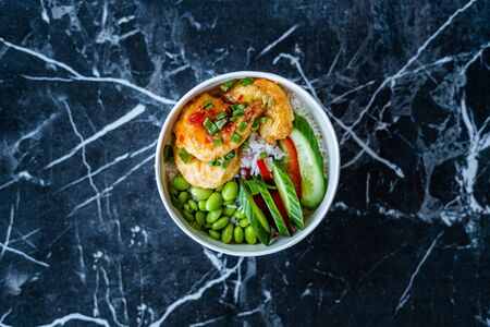Take Away Healthy Buddha Bowl with Shrimp, Edamame Beans, Cucumber and Basmati Rice / Poke Bowl in...