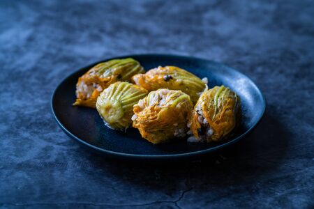 Zucchini Flowers Dolma Stuffed with Rice Pilaf / Turkish Food in Plate. Traditional Organic Food.の写真素材