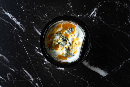 Take Away Healthy Turkish Food Spinach Borani with Yogurt / Yogurt and Red Oil Sauce. Traditional...