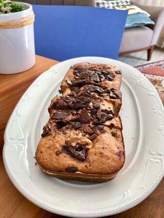 Homemade Organic Healthy Banana Bread Cake Slices with Chocolate Pieces and Walnut. Ready to Eat.
