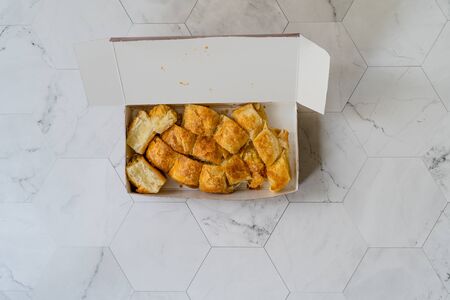 Take Away Burek Bosnian Borek Manti Pastry with Potatoes in Plastic Box / Package. Traditional Food.