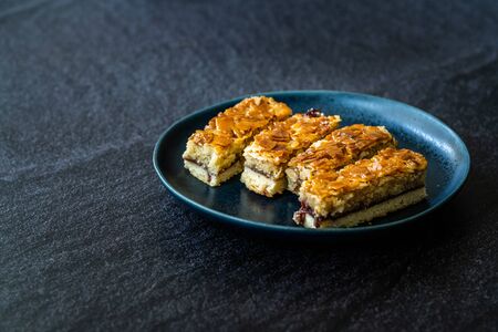 Scandinavian Dessert Swedish Tosca Cake Slices / Toscakaka. Traditional Food.