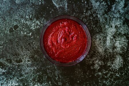 Beetroot Hummus Dip / Beet Puree Paste Ready to Serve and Eat in Glass Bowl.の写真素材