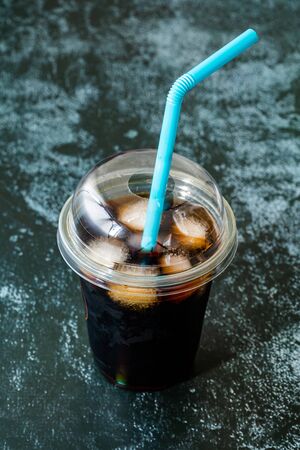 Take Away Cold Brew Coffee with Ice in Plastic Glass and Straw For Summer.の写真素材