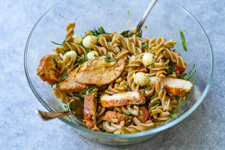 Italian Food Bowl Salad with Fusilli Pasta, Spicy Chicken, Mozzarella Balls, Spinach, Vinaigrette...