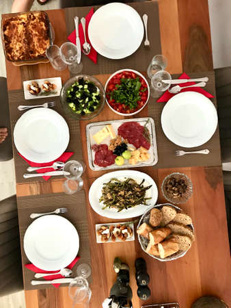 Healthy Organic Homemade Food on Wooden Table at Home. Traditional Dish.