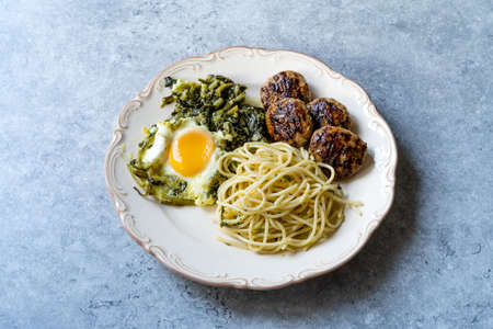 High Protein Homemade Diet Plate with Spinach Egg, Meatballs and Spaghetti. Three Type of Athlete Food. Healthy Organic Food.の写真素材