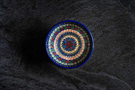 Handmade Ceramic Bowls and Cups Handcrafted with Traditional Ottoman Pattern on Dark Surface and...