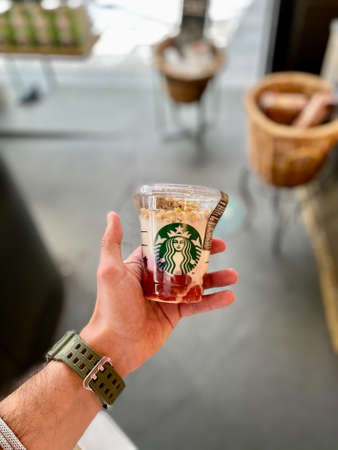 Istanbul - Turkey 14 December 20 2018 Starbucks Food Parfait with Yogurt and Granola Holding in Hand Plastic Cup. Take Away. Ready to Eat.のeditorial素材