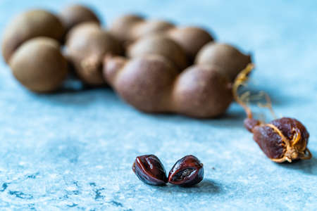 Pile of Ripe Sweet Tamarind Fruits with Shell. Ready to Eat.の写真素材