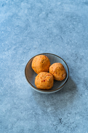 Traditional Turkish Spicy Surk Cheese Balls from Hatay in Turkey. Shanklish Orange Color. Ready to Eat and Serve.の写真素材