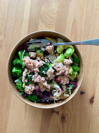 Healthy Food Bowl with Tuna Fish, Broccoli, Brussel Sprouts, Mexican Beans and Fusili Pasta. Buddha Bowl in Plastic Box Package Container. Ready to Deliverの写真素材
