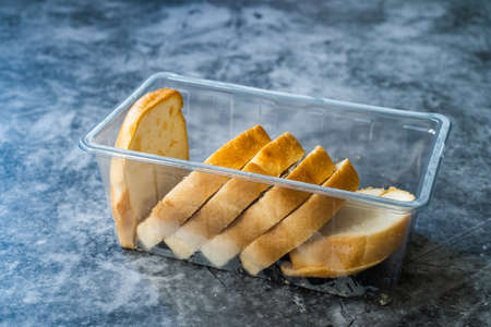 Take Away Gluten Free Bread Slices in Plastic Box Container or Package. Take out for Sale. Ready to...