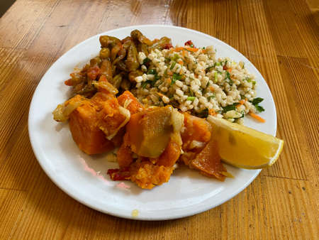 Turkish Style Healthy Olive Oil Food Vegan or Vegetarian Plate with Pumpkin, Wheat Salad and Okra. Organic Food.の写真素材
